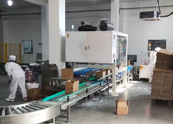 Spider hand unboxing machine on-site